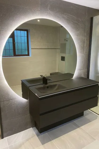 Fully fitted bathroom with modern suite